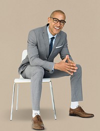 African Descent Business Man Sitting Smiling