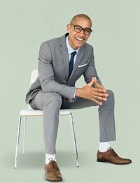 African Descent Business Man Sitting Smiling