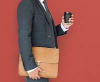Business Man Holding Coffee and Bag