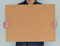 Man Holding Cork Board Copy Space Concept
