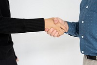 Casual business people shaking hands in agreement
