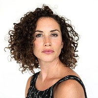 Portrait of beautiful woman with curly hair