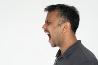 Indian guy screaming loud studio portrait