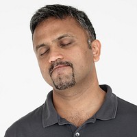 Indian guy closed eyes studio portrait