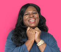 Studio portrait of an overjoyed woman