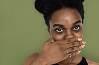 African Woman Hand Cover Mouth