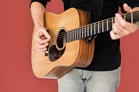 Caucasian Man Playing Guitar Closeup