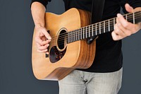 Caucasian Man Playing Guitar Closeup