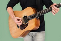 Caucasian Man Playing Guitar Closeup