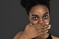 African Woman Hand Cover Mouth