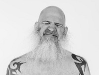 Portrait of a big tattooed bearded man
