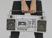 Woman holding a boombox
