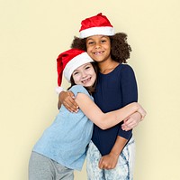 Little Girls Friends Hugging Christmas Hat