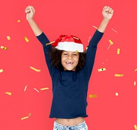 Portrait of a kid wearing a Santa hat