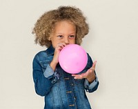 Portrait of a Little African Descent Boy with a Balloon Isolated