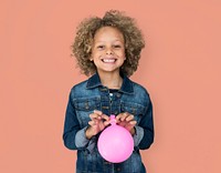 Portrait of a Little African Descent Boy with a Balloon Isolated