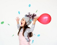 A girl with red ballon having fun