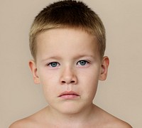 Caucasian Little Boy Frowning Bare Chested