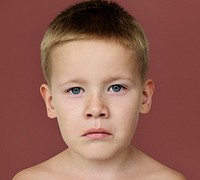 Caucasian Little Boy Frowning Bare Chested