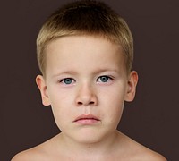 Caucasian Little Boy Frowning Bare Chested