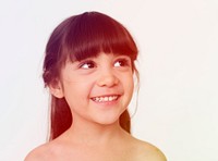 Young girl smiling and looking