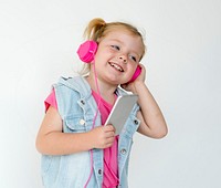 Portrait of a young girl with pink headphones