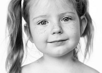 Portrait of a young girl with freckles