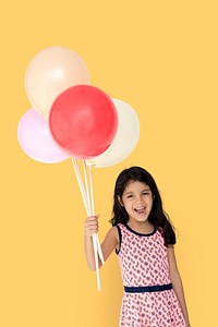 Little Girl Happy Holding Balloon