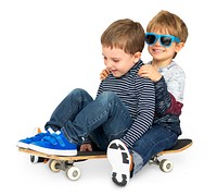 Little Kids Smiling Playing Sitting Skateboard