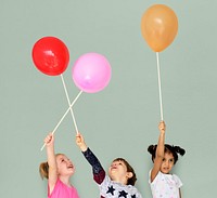 Little Children Playing Balloon Fun Smiling