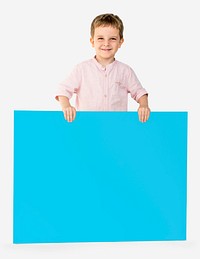 Little Boy Holding Empty Paper Smiling
