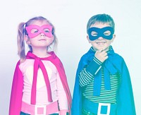 Brother and sister wearing the costume superheroes