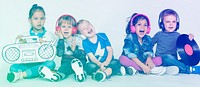 Group of kids smiling having fun and listening music