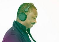 African man listening music with headphone