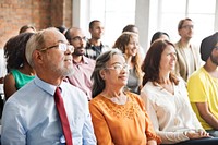 A group of diverse audience in a meeting