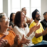 Audience cheerfully applausing