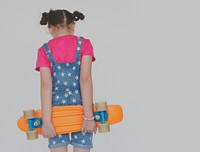 Little Girl Holding Skateboard Sport Activity Portrait