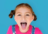 Little Girl Smiling Happiness Sticking Out Tongue Studio Portrait