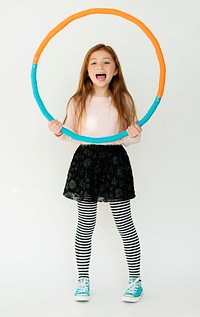 Little Girl Smiling Happiness Hula Hoop Studio Portrait