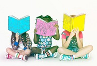 Children sitting and Reading Book
