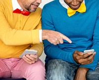 Two colorful men and their phones