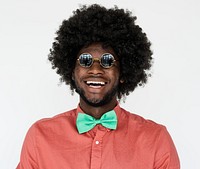 Portrait of a man with an Afro wig and glasses