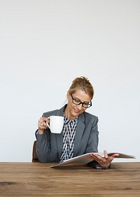Woman Reading Magazine Hand Hold Cup