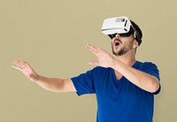 A man using a visualiaing reality gadget