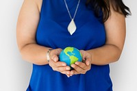 Woman holding global ball in her hands
