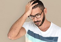 Middle Eastern Man Curious Stress Thinking Studio Portrait