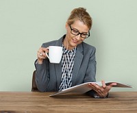 Businesswoman Reading Documents Coffee Drinks Working