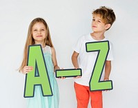 Kids holding letters of the alphabet