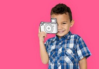 Boy taking a photo with a cardboard camera