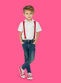 A Caucasian Boy Standing Crossing Legs Background Studio Portrait